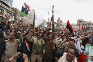 Shiite rebels, known as Houthis, gather to protest against Saudi-led airstrikes