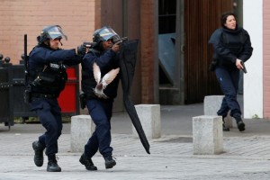 French SWAT forces during the morning Saint-Denis raid. (AP/Francois Mori)