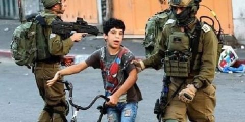 Palestinian boy led to safety
