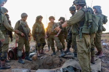 IDF soldiers stand around a Hamas terror tunnel opening. (Flash 90)