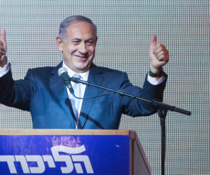 Israeli Prime Minister and leader of the "Likud" party Benjamin Netanyahu waves to supporters. (Miriam Alster/FLASH90)