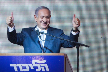 Israeli Prime Minister and leader of the "Likud" party Benjamin Netanyahu waves to supporters. (Miriam Alster/FLASH90)