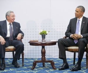 U.S. President Barack Obama, right, meets with Cuban President Raul Castro at the Summit of the Americas in Panama City, Panama on Saturday, April 11, 2015. The leaders of the United States and Cuba held their first formal meeting in more than half a century on Saturday, clearing the way for a normalization of relations that had seemed unthinkable to both Cubans and Americans for generations. (AP Photo/Pablo Martinez Monsivais)