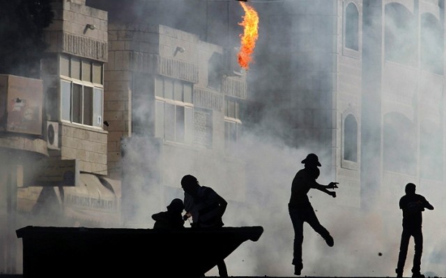 Police suspect Arab arson at two Jerusalem synagogues