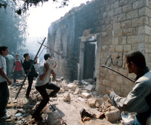 Palestinians destroy Joseph's Tomb in 2000.