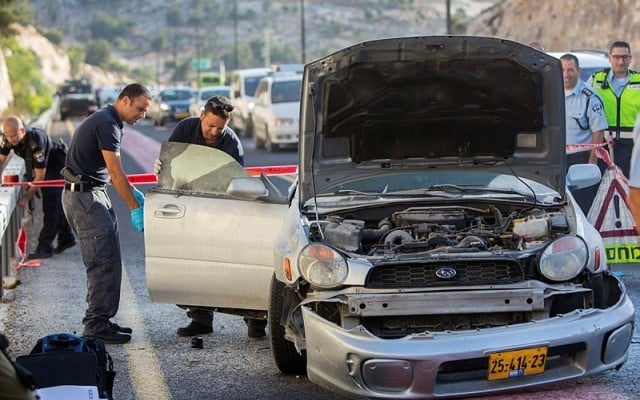 Palestinian terrorist explodes car bomb near capital; Israeli officer wounded