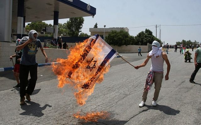 New law: 3 years prison for desecrating Israeli flag