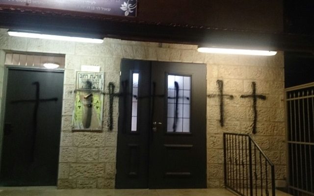Jerusalem synagogue defaced with crosses
