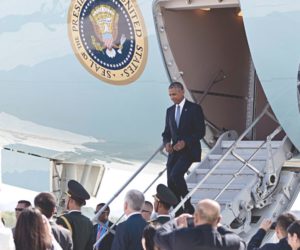 Obama arrives in China