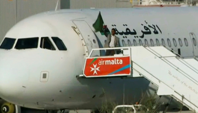 Hijacking of Libyan plane ends peacefully; 2 hijackers surrender 