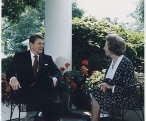 President Reagan and Prime Minister Thatcher talking on patio outside Oval Office