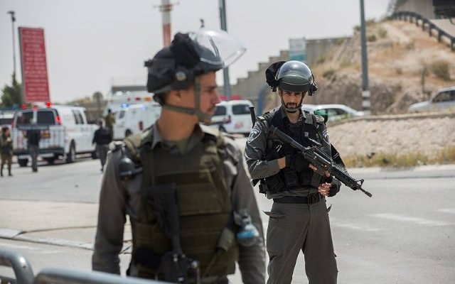 Palestinian suspect shot while threatening Israeli forces