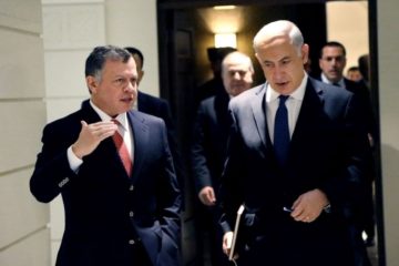 Prime Minister Benjamin Netanyahu, right, and Jordan's King Abdullah II, during the former's surprise visit to Amman on January 16, 2014 (photo credit: AP/Yousef Allan/Jordanian Royal Palace)