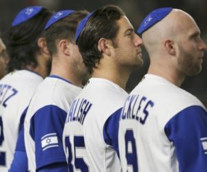 Nick Rickles (R) and Jake Kalish (2R) and others before Israel's game against the Netherlands