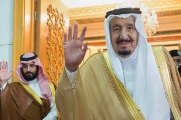 Saudi King Salman (R) and his son Mohammed bin Salman