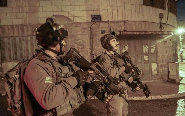 Israeli forces raid Palestinian village and seize weapons