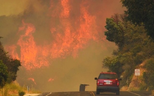 Wildfires sear California, Canada