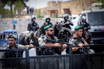 Israeli police stand guard outside Jerusalem Old City