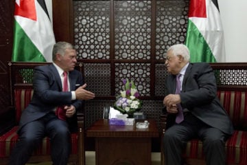 Palestinian President Mahmoud Abbas, right, meets with Jordan's King Abdullah II at his office in the West Bank city of Ramallah, Monday, Aug. 7, 2017. (AP Photo/Nasser Nasser, Pool)