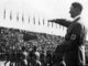 Hitler giving the Nazi salute