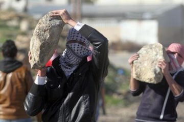 Arab rock throwing terrorists