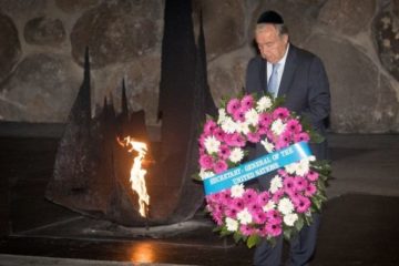 UN Secretary General Antonio Guterres places a wreath during a ceremony at the Hall of Remembrance in the Yad Vashem Holocaust memorial
