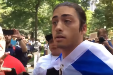 Wearing Israeli flag at protest