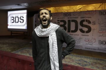 BDS supporter (illustrative) (AP/Amr Nabil, File)