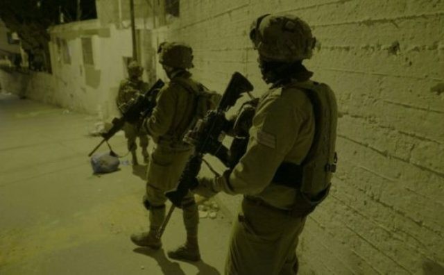Israeli forces expose Palestinian weapons factory, confiscate cash
