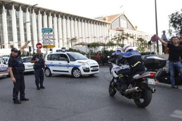 French police officers after stabbing attack (AP Photo/Claude Paris)
