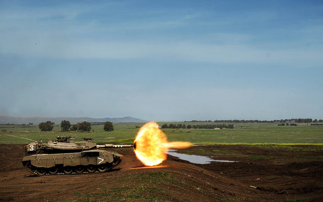 Israel fires warning shot at Syrian military position