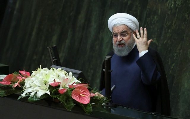 Iranian president says US waging economic war