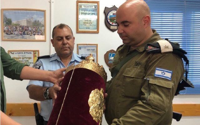 Police recover Torah scrolls stolen by Palestinians