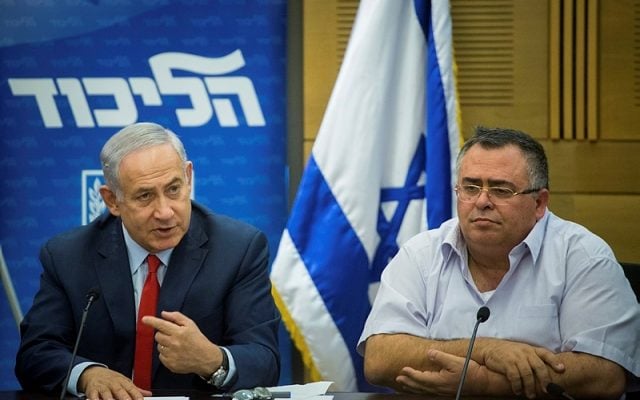 Netanyahu names ministers to take over portfolios law requires he vacate