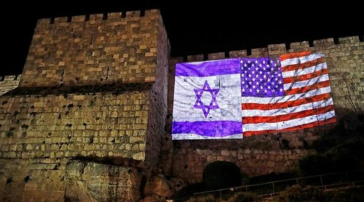 US, Israeli flags adorn Jerusalem’s Old City walls in tribute to Trump