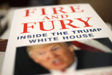 Copies of the book "Fire and Fury: Inside the Trump White House" by Michael Wolff. (AP Photo/Charles Rex Arbogast)