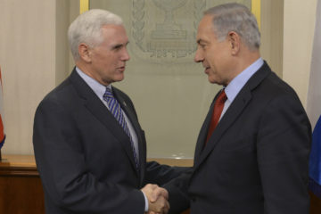 Israeli Prime Minister Benjamin Netanyahu meets with Michael Pence in 2014. (Amos Ben Gershom/GPO)