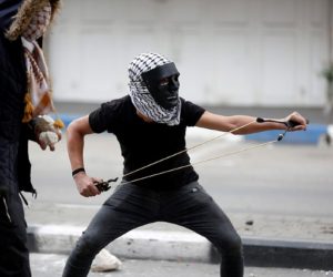 rock throwing Palestinian