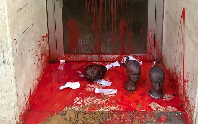 Severed doll heads doused in red paint left at Tel Aviv immigration office