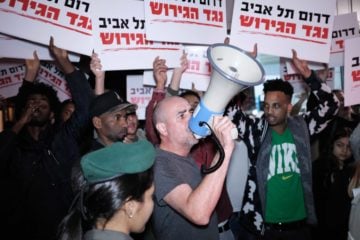 Africans and activists protest in south Tel Aviv. (Tomer Neuberg/Flash90)