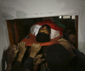 Funeral of Ibrahim Abu Thuraya. (AP Photo/ Khalil Hamra)
