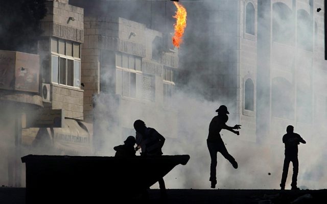Palestinians throw firebombs at IDF in Samaria, teen killed amid rioting
