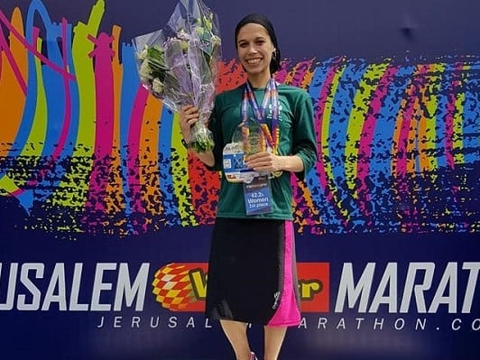 Orthodox mother of 5 ranks as top Israeli finisher in Jerusalem Marathon