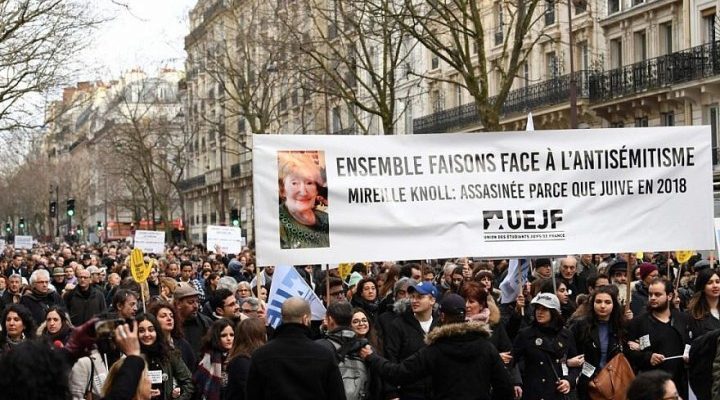 Thousands march in Paris to honor murdered elderly Holocaust survivor