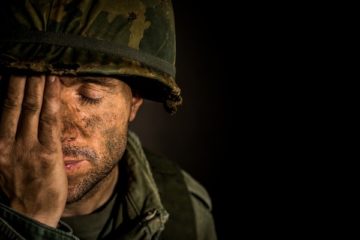 Soldier suffering from PTSD, trauma or loss