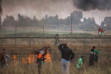 Rioters near the border fence east of Gaza City. (Wissam Nassar/FLASH90)