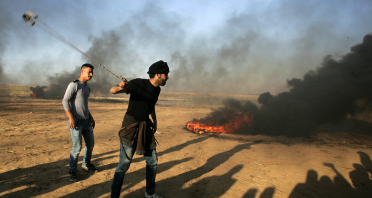 Palestinian rioters try to breach barrier with explosives, Molotov cocktails