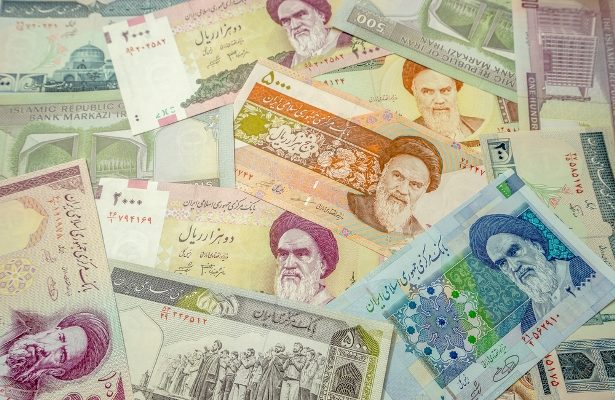 Iran’s currency drops 18% in 2 days as resumed sanctions loom
