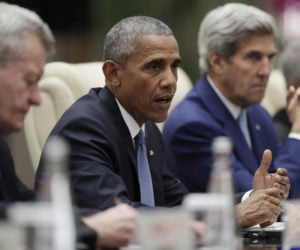 Former President Barack Obama and former Secretary of State John Kerry. (AP Photo/Carolyn Kaster)