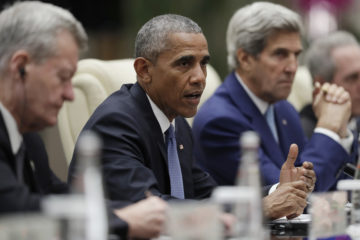 Former President Barack Obama and former Secretary of State John Kerry. (AP Photo/Carolyn Kaster)